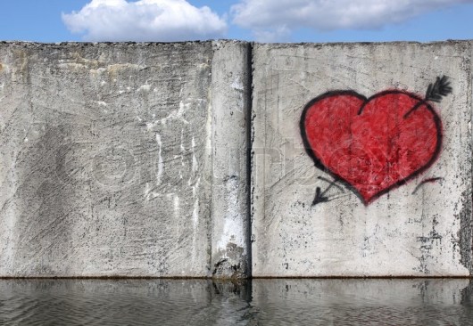 2244700-red-heart-on-a-fence